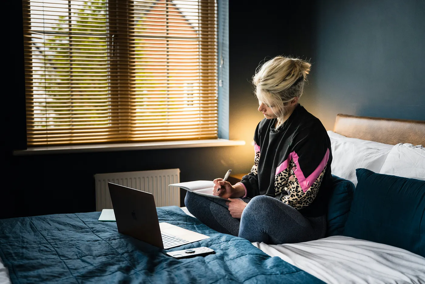 woman writing note-taking system